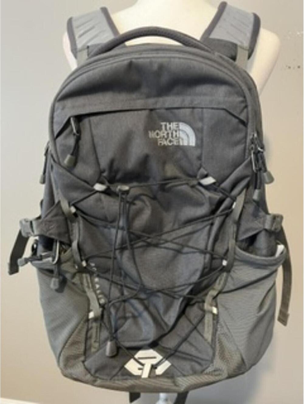 The North Face Gray Backpack with Multiple Compartments and Adjustable Straps